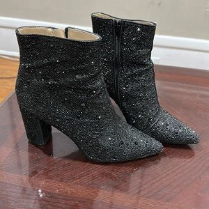 Betsey Johnson, heeled boots. Worn 1 time. Too big.